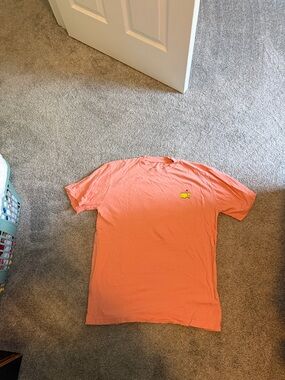 Masters Coral Tee with Green and Yellow Back Graphic
